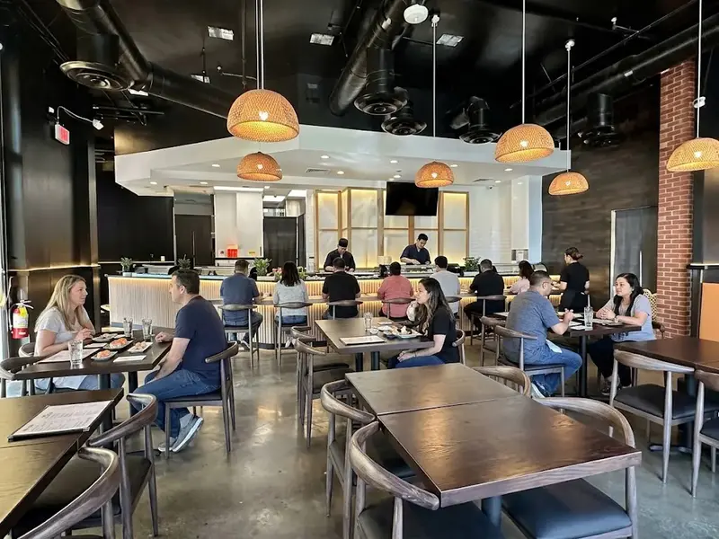 Modern restaurant interior design at Orange Fish Sushi